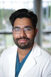 Ejo John, MD